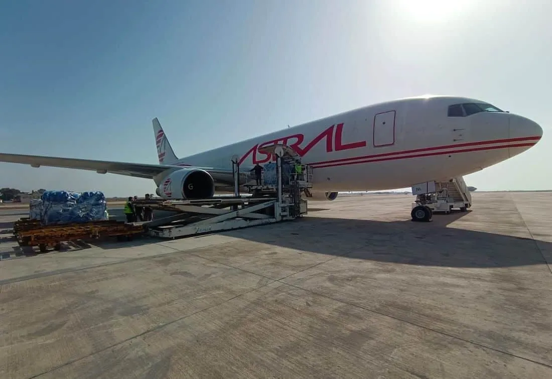 Relief supplies loaded into airplane