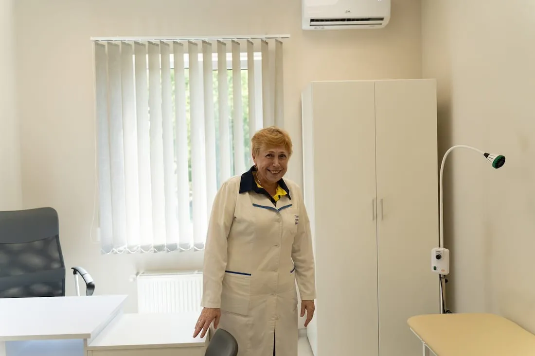 woman stands in medical room