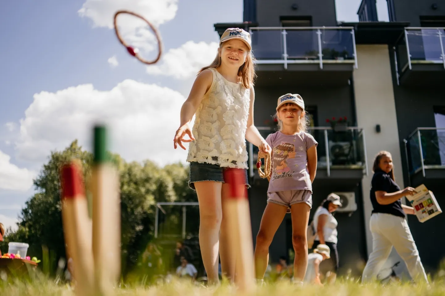 young children play ring toss