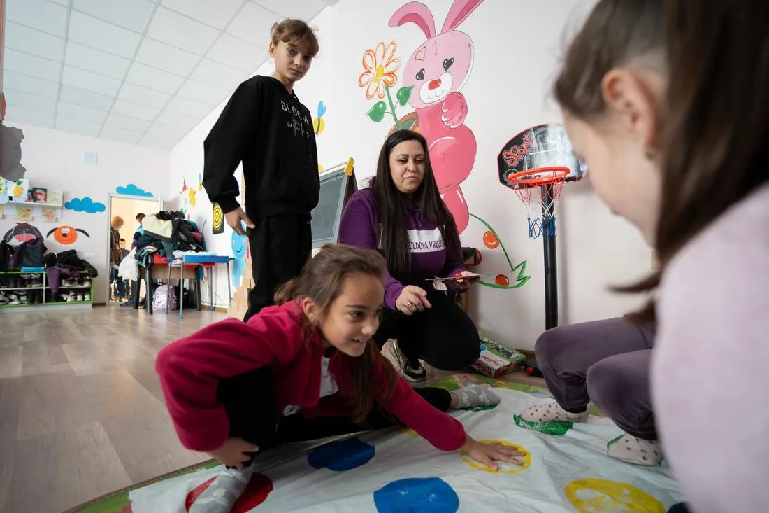 young kids playing twister
