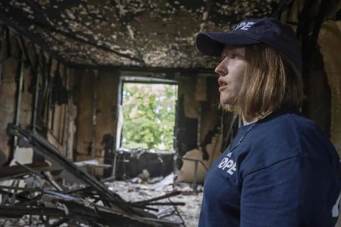 Julia surveys the damage in Borodianka, where she is from
