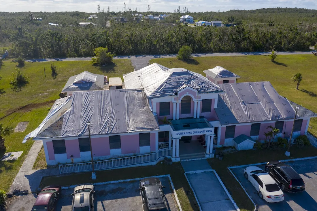eagle-eye view of hospital with damaged roof