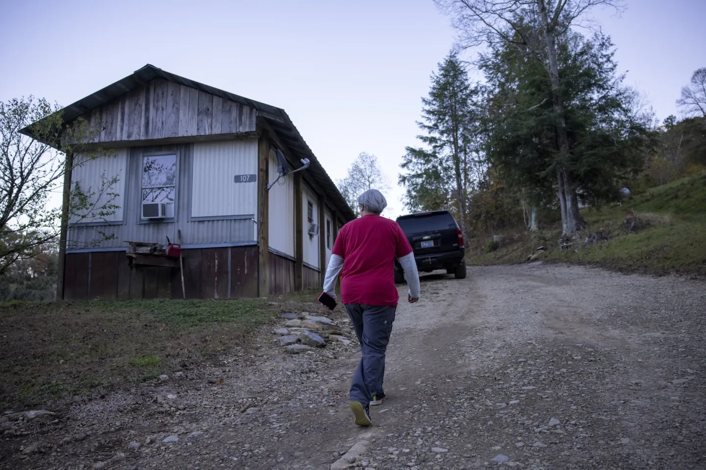 woman walking up to a home in North Carolina