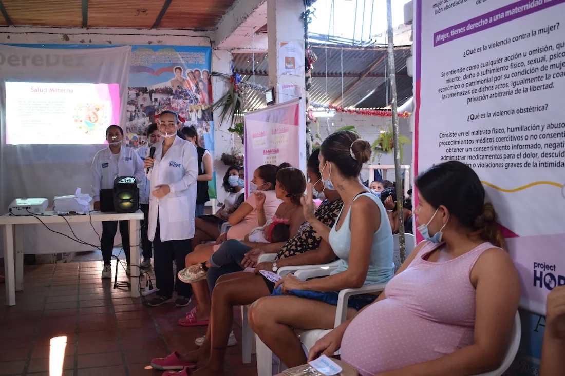 group of pregnant women and new mothers getting counseling services.