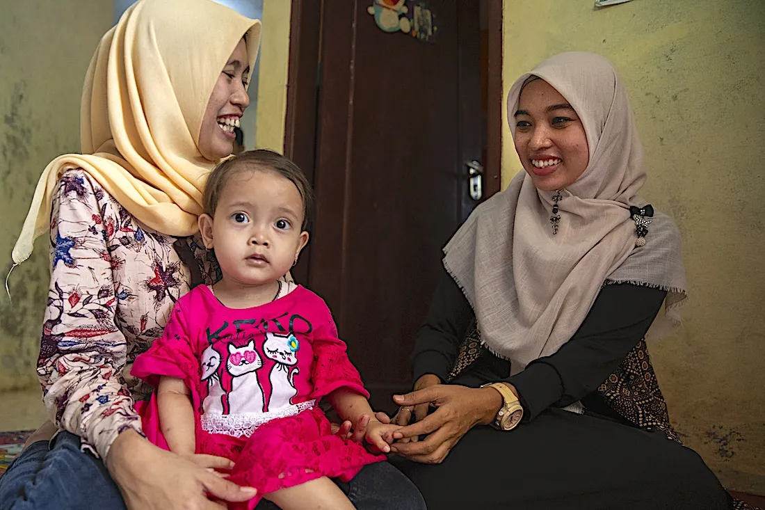 Two women and a girl