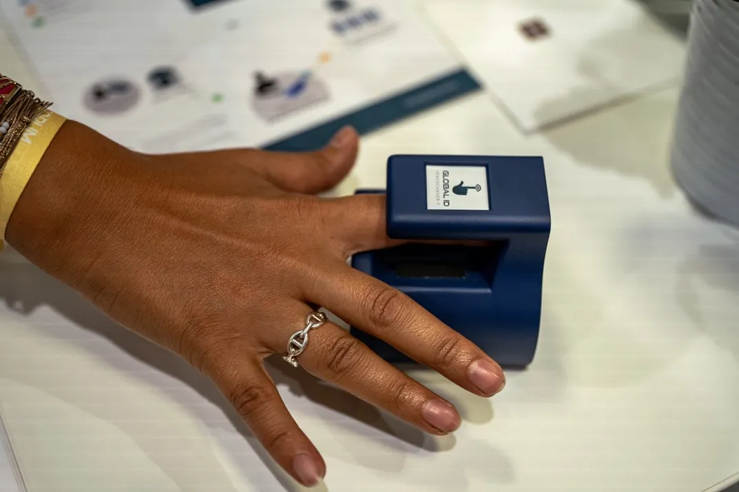 finger gets examined for biometric information