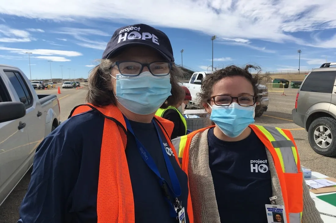 Two women in facemasks