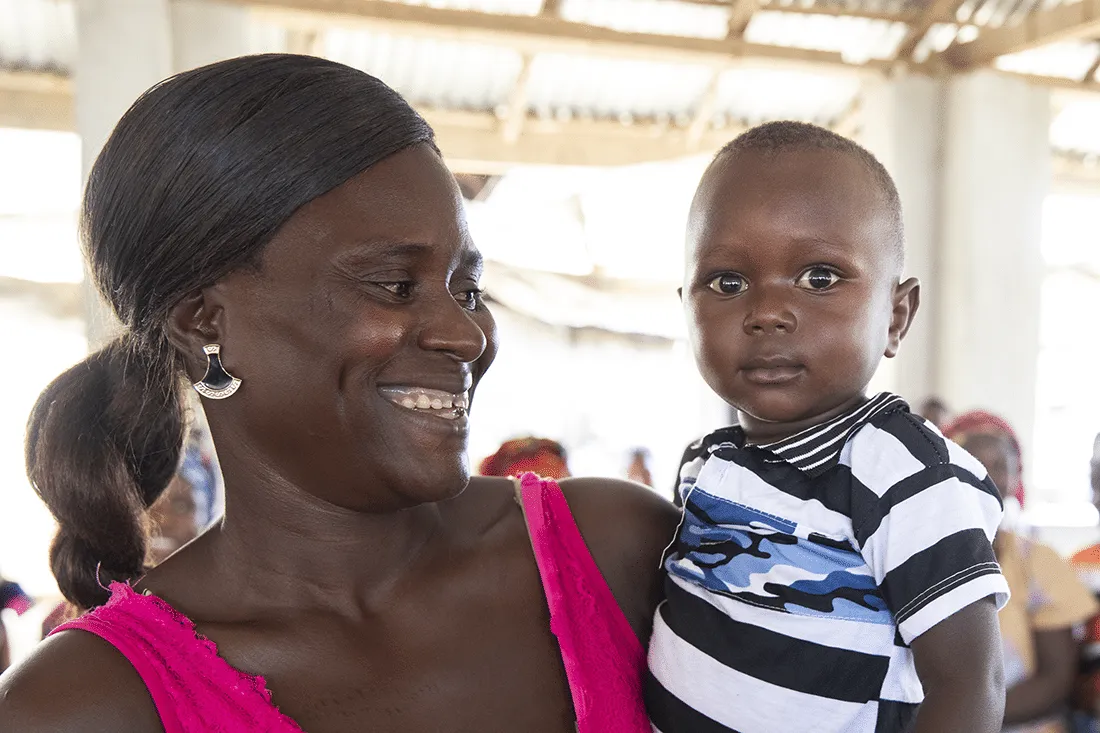 Mother smiling at her child.