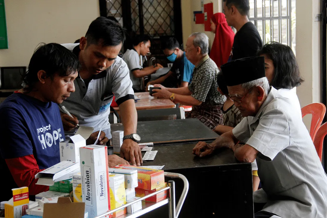 group of people getting medical care